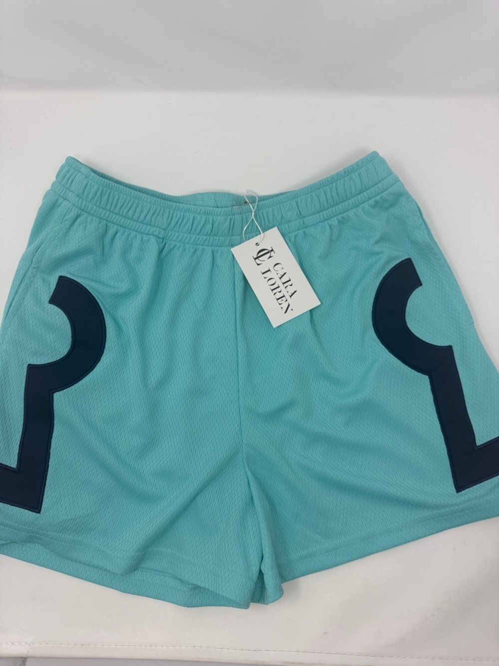 Women’s Cara Loren Aqua Athletic Shorts with Navy Accents size Small NWT